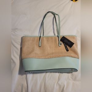 Brand new never used with tags Izzy & Ali rattan bag with leather bottom